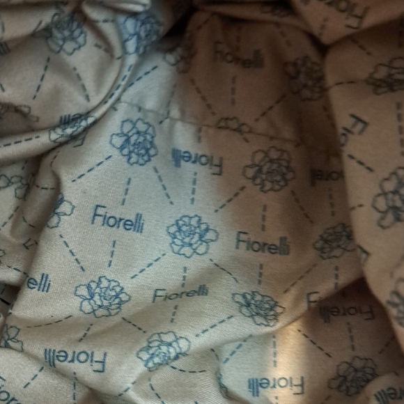 Tassel Accent Tan Leather Sling Backpack - Picture 9 of 9